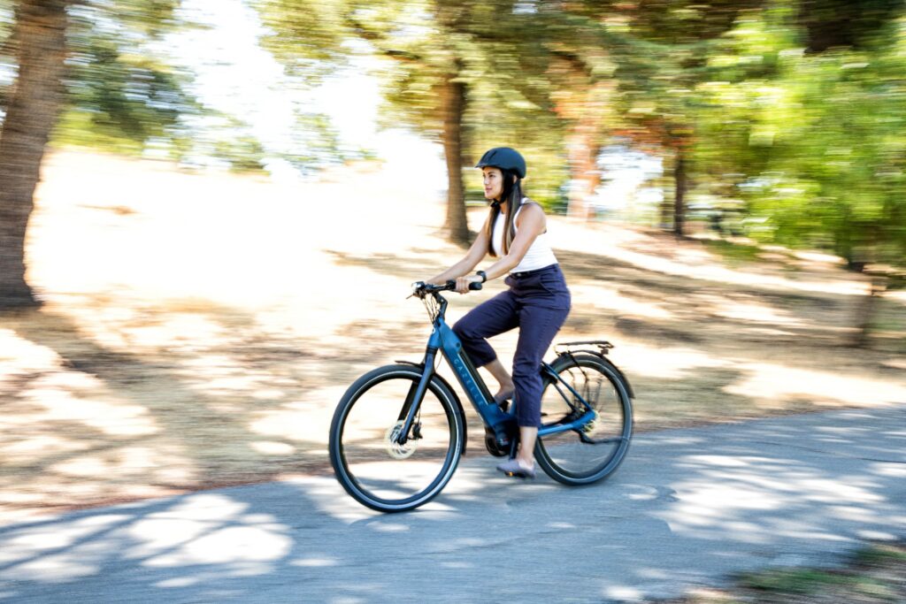 Woman on bicycle | Ultimate C380